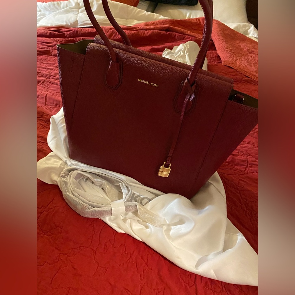 Dark red Michael kors purse with gold hardware